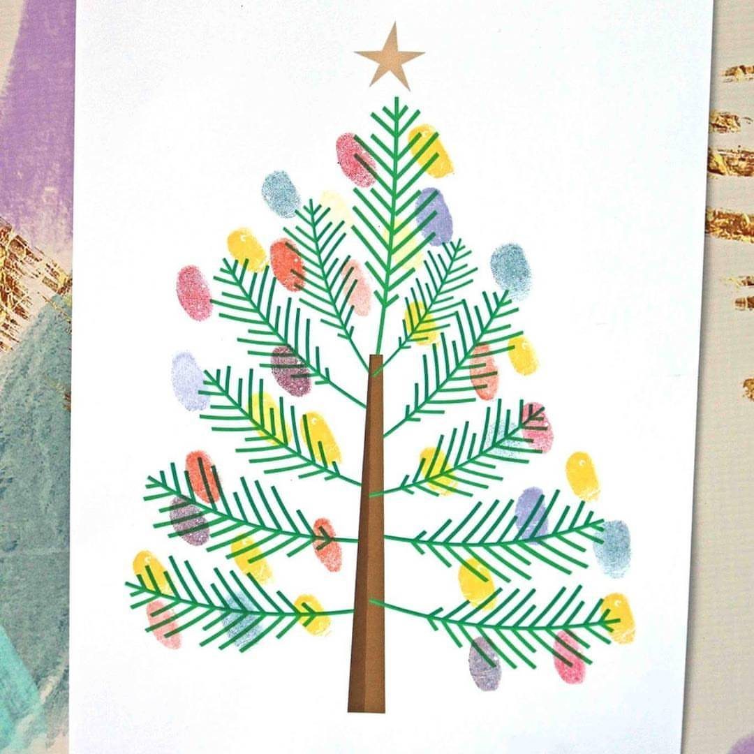 A green Christmas tree decorated with colorful thumbprint ornaments and a gold star.