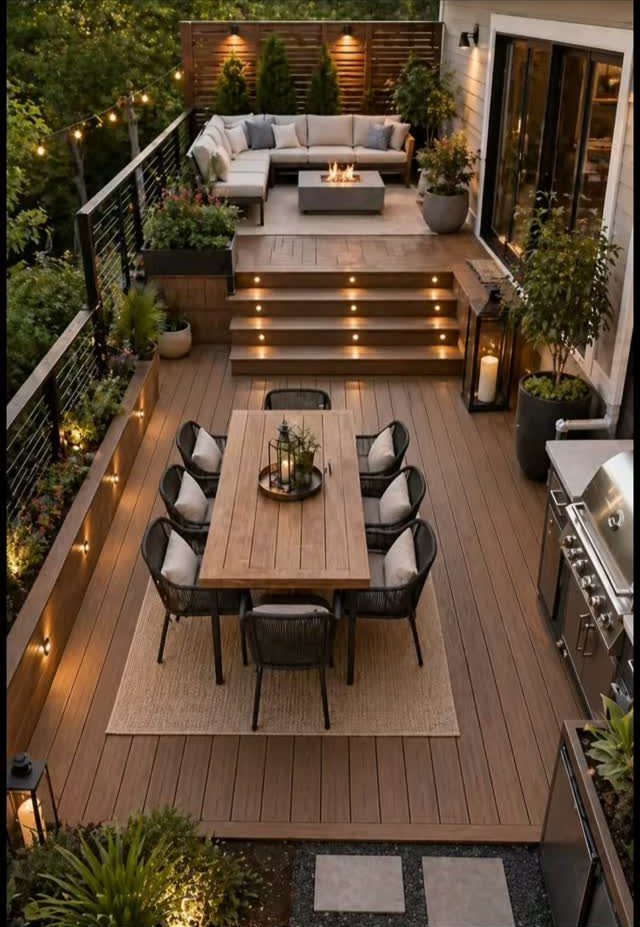 Multi-level wooden deck featuring a dining set and a lounge area with a sectional sofa.