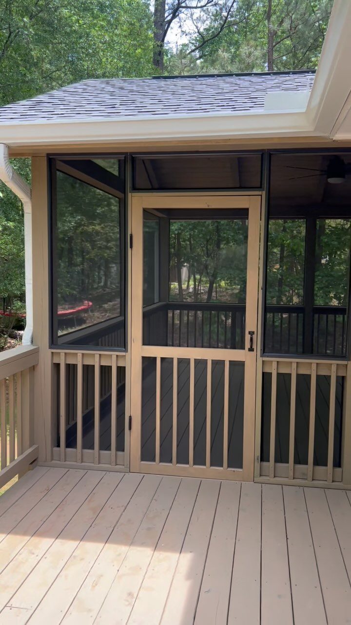 12 Porch and Deck Ideas for Outdoor Living 6 A light-colored wooden screened-in porch overlooking a dense green forest.