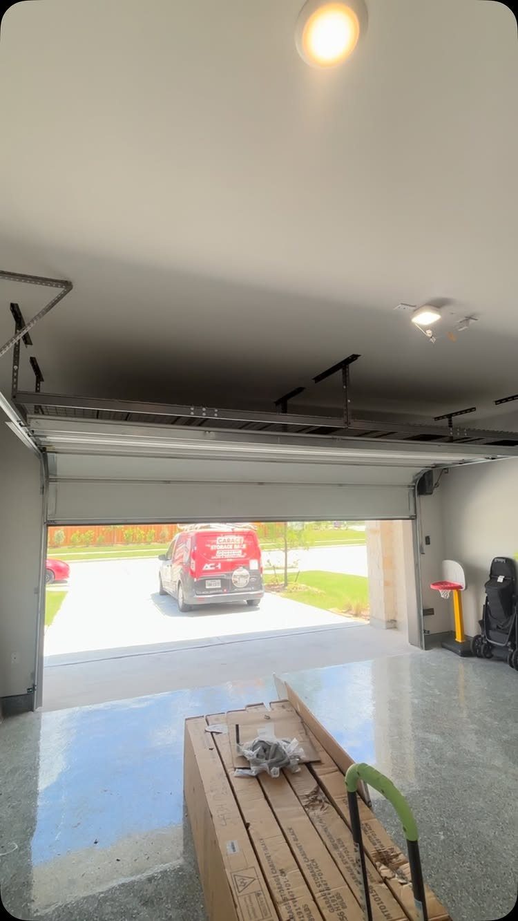 6 Small Garage Building Ideas for Storage, Projects & Living Space 6 An open garage featuring a glossy, light blue epoxy floor coating and a white van outside.